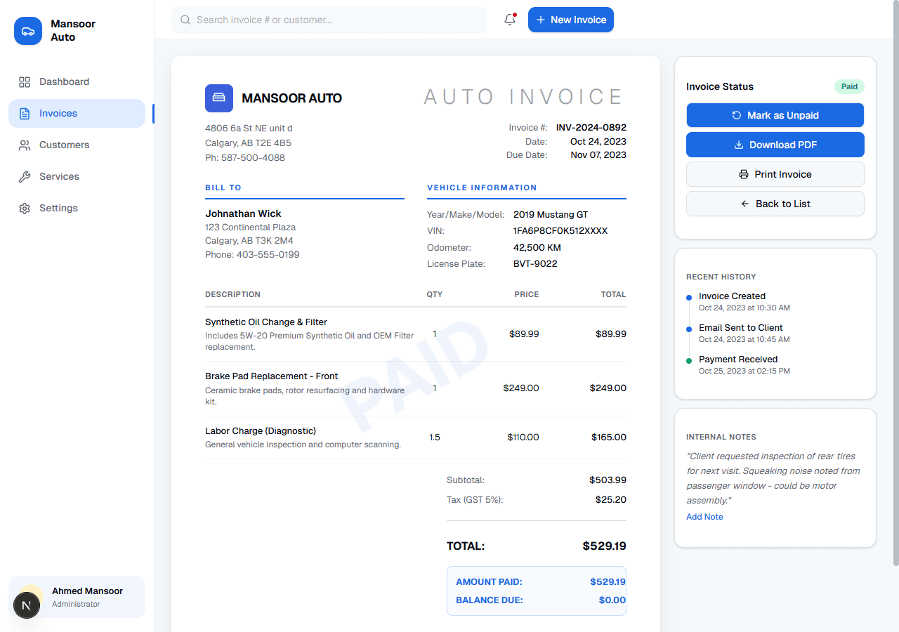 Strut Pay — professional auto repair invoice with paid status and payment history